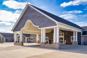 The Villas of Holly Brook & Reflections Memory Care entrance on North Towanda Barnes Road in Bloomington, IL.