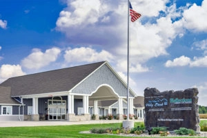 The Villas of Holly Brook & Reflections Memory Care entrance on Stone Bridge Drive, just off Murray Road, in Rantoul, IL.