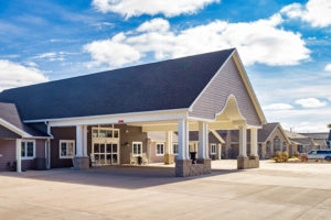 The Villas of Holly Brook & Reflections Memory Care entrance on South 14th Street in Pekin, IL.