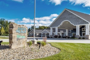 The Villas of Holly Brook & Reflections Memory Care entrance on Enterprise Lane, just off West 9th Street, in Mt. Carmel, IL.