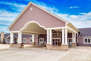 The Villas of Holly Brook & Reflections Memory Care entrance on Ron Crank Drive, just off the Harrisburg Bypass, in Harrisburg, IL.