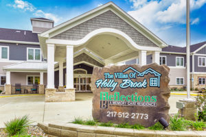 The Villas of Holly Brook & Reflections Memory Care entrance on 18th Street in Charleston, IL.