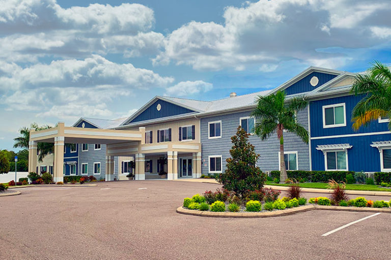 The Villas of Holly Brook & Reflections Memory Care entrance on 14th Street in Bradenton, FL.